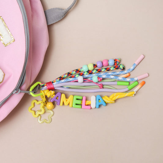 Personalised Retro Bag Charm With Rope Tassels