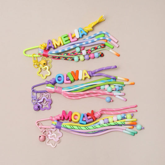 Personalised Retro Bag Charm With Rope Tassels